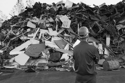Front view of a house clearance crew assessing items before removal