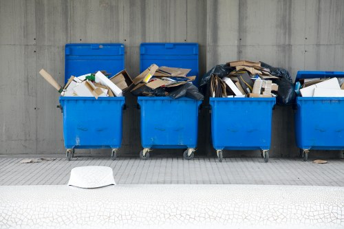 Professional team conducting loft clearance in a Tooting home