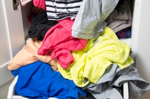 Middle-stage of a house clearance showing sorted recyclables